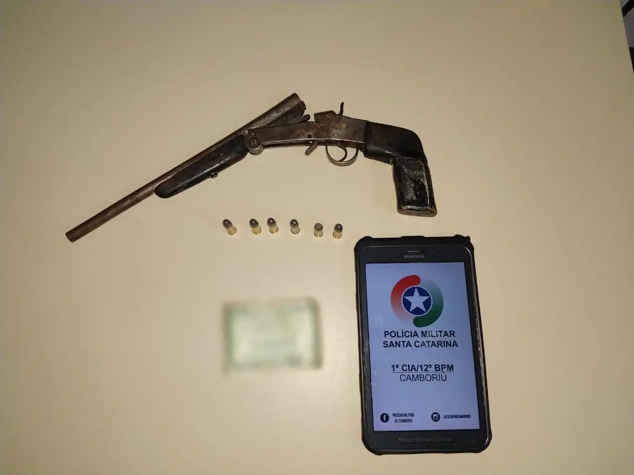Homem é preso com arma de fogo em evento religioso