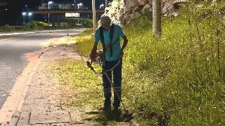 Serviços de roçada são realizados de noite na Avenida Beira Rio - 1